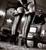 Dwie pary n�g w czarnych po�czochach
Paris, 1979 
gelatin silver print 
signed, titled, dated and numbered '6/10' in pencil (on the verso) 
19¼ x 18½in. (48.8 x 47cm.)
