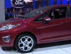 [Ang.] Ford turns profit