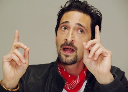 Adrien Brody �amie o��wek dolarem