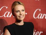 Charlize Theron adoptowa�a